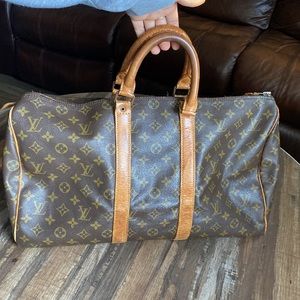 Vintage authentic Louie Vuitton travel bag